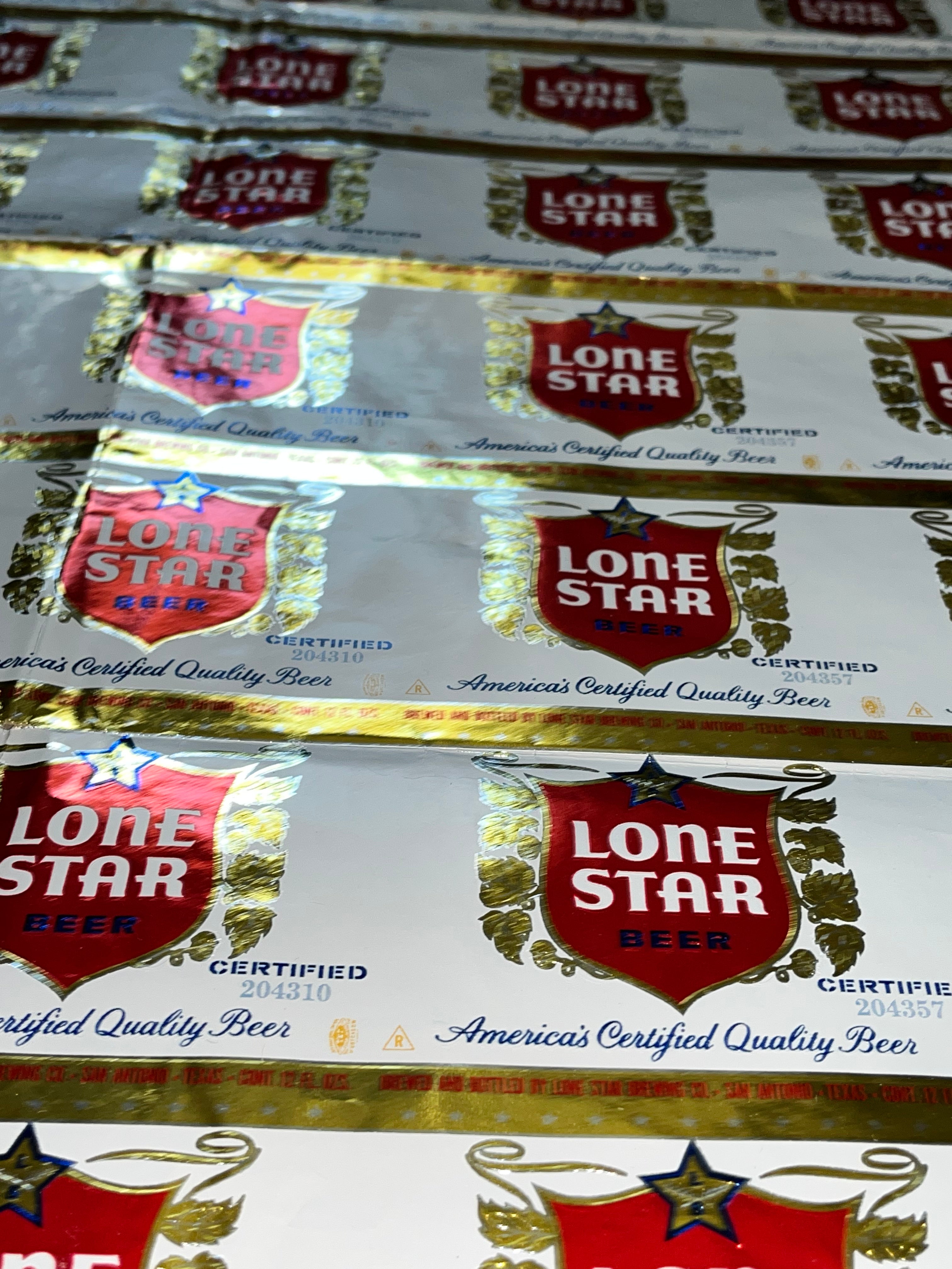 1959 Set of Sheets of Lone Star Embossed Foil Longneck Bottle Labels, with neck label and original bottle.
