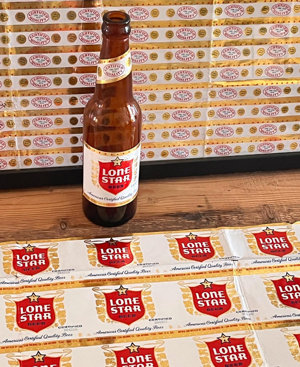 1959 Set of Sheets of Lone Star Embossed Foil Longneck Bottle Labels, with neck label and original bottle.