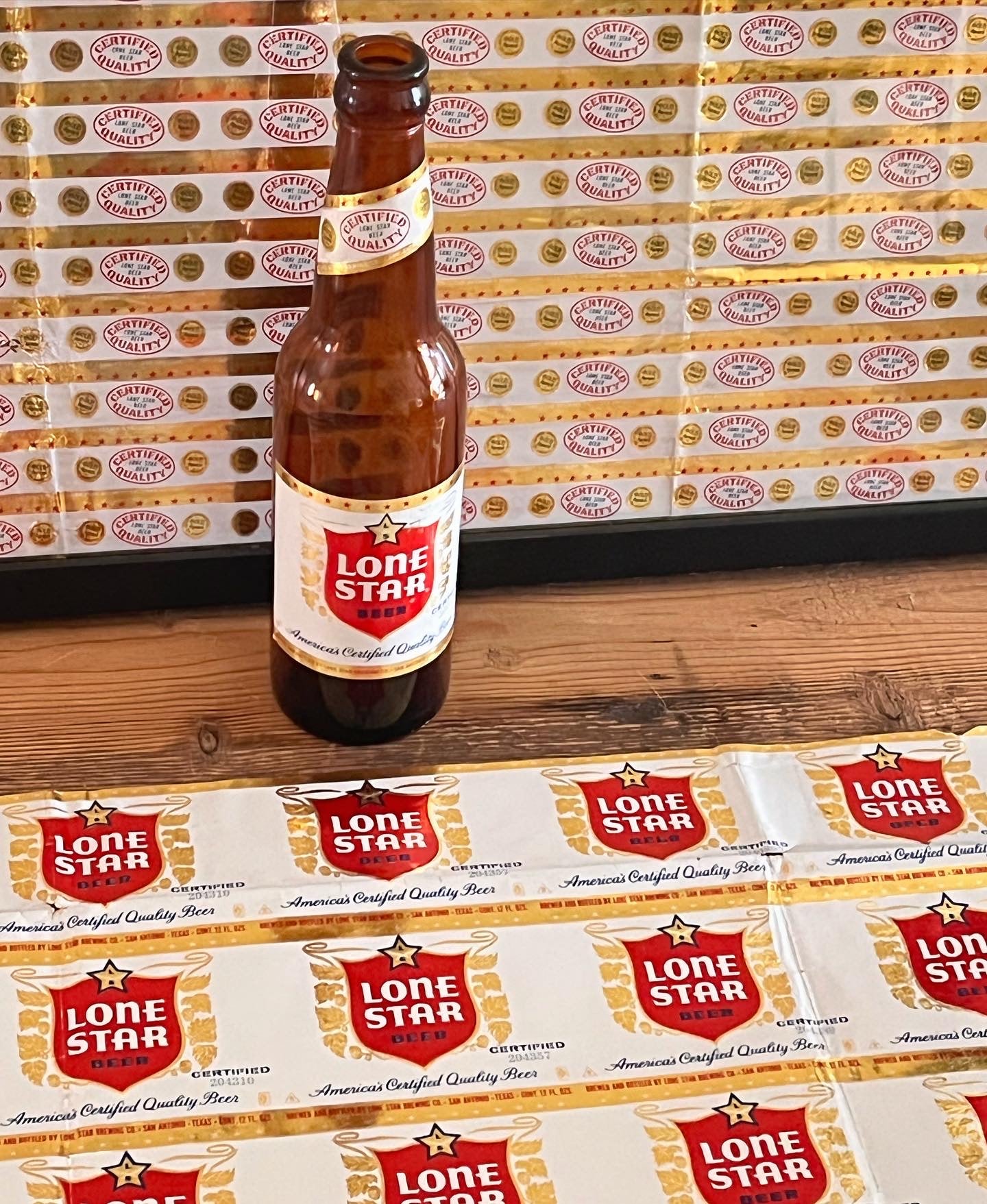1959 Set of Sheets of Lone Star Embossed Foil Longneck Bottle Labels, with neck label and original bottle.