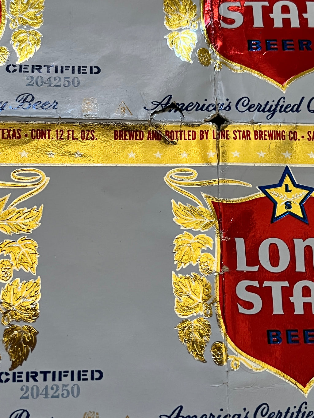 1959 Set of Sheets of Lone Star Embossed Foil Longneck Bottle Labels, with neck label and original bottle.
